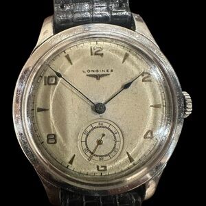 Vintage Longines Classic Silver and Black Timepiece